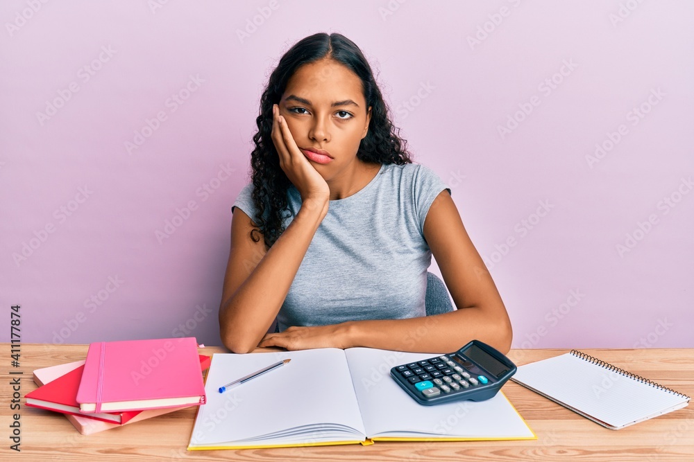Sticker Young african american girl accountant working at the office thinking looking tired and bored with depression problems with crossed arms. - Stickers