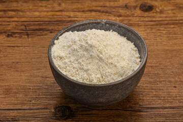 Wheat flour heap in the bowl