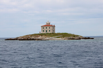 Fototapeta na wymiar Leuchtturm auf Insel