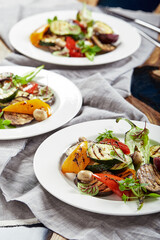 Grilled vegetables on a white plates. restaurant