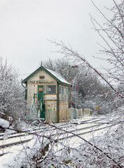 Railway signal box in snowy winter