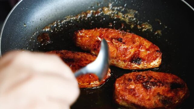 Kerala Fish fry , frying King fish in coconut oil, fresh seafood curry served in house boat of Alappuzha India Sri Lanka 4K slow motion video footage. Indian non vegetarian food. Bengali fish curry	