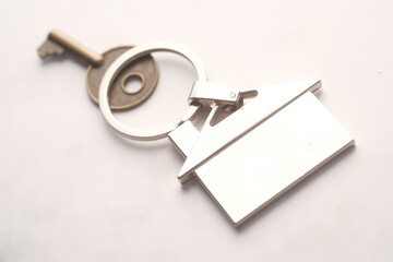  the concept of finance concept with key and ring on white 