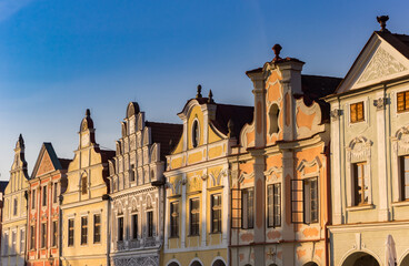 Fototapeta na wymiar Historic houses in evening light at the market square in Telc|, Czech Republic
