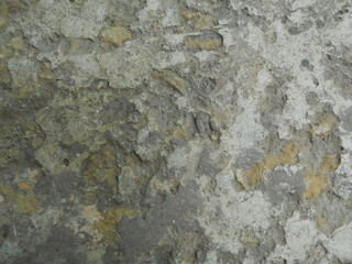 
Rough gray surface of stone or concrete with chipped and half-tones 