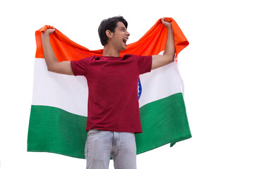 young man lifting indian flag in excitement, independence day	