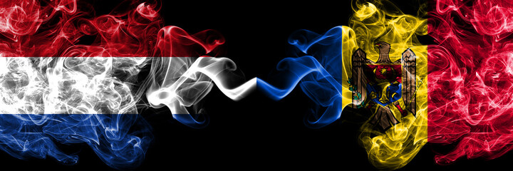 Netherlands vs Moldova, Moldovan smoky mystic flags placed side by side. Thick colored silky...