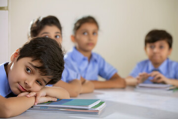 Fototapeta na wymiar children sitting in a classroom 