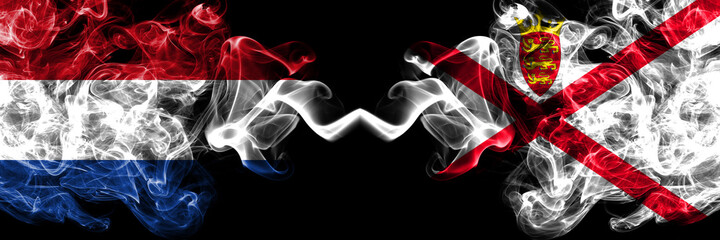 Netherlands vs United Kingdom, Great Britain, British, Jersey smoky mystic flags placed side by side. Thick colored silky abstract smoke flags.