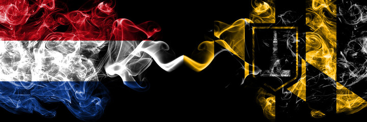 Netherlands vs United States of America, America, US, USA, American, Baltimore, Maryland smoky mystic flags placed side by side. Thick colored silky abstract smoke flags.