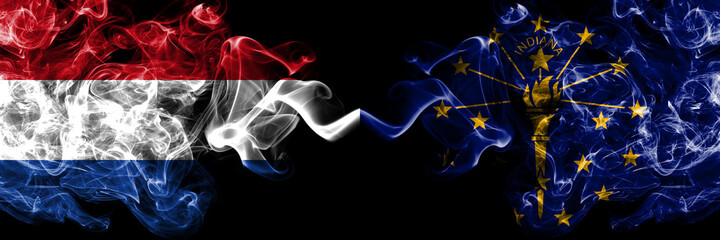 Netherlands vs United States of America, America, US, USA, American, Indiana smoky mystic flags placed side by side. Thick colored silky abstract smoke flags.