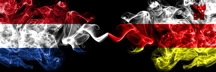 Netherlands vs United States of America, America, US, USA, American, Santa Barbara, California smoky mystic flags placed side by side. Thick colored silky abstract smoke flags.