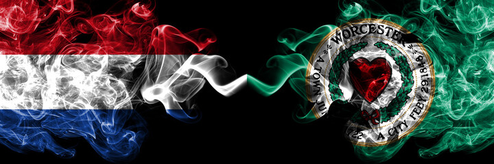 Netherlands vs United States of America, America, US, USA, American, Worcester, Massachusetts smoky mystic flags placed side by side. Thick colored silky abstract smoke flags.