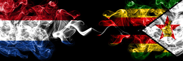 Netherlands vs Zimbabwe, Zimbabwean, Zimbo smoky mystic flags placed side by side. Thick colored silky abstract smoke flags.