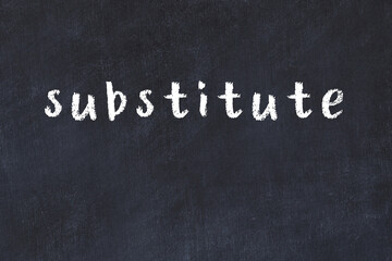 Black chalkboard with inscription substitute on in