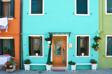 Facades of a colourful buildings in Burano Italy