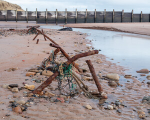 Remains of World War Two coastal, beach, defences on Blyth Beach, Northumberland, England, UK. That...