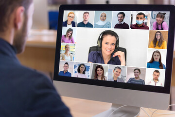 Online remote school class concept. Mixed race college student distance learning using computer conferencing with teacher and classmates group. Learning from home during quarantine and coronavirus.