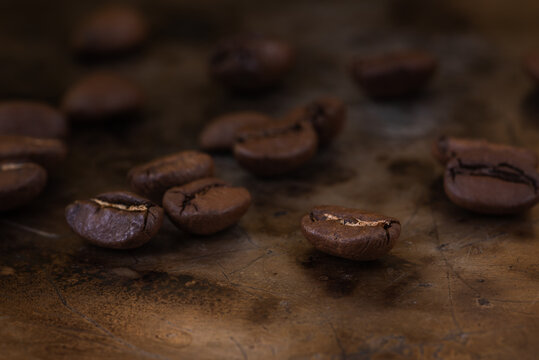 Roased Coffee beans on brown background © salita2010