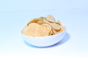 Delicious potato chips, isolated on white background 