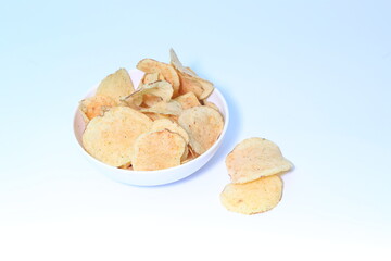 Fototapeta na wymiar Delicious potato chips, isolated on white background 