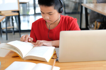 boy student studying learning lesson online. remote meeting distance education at home