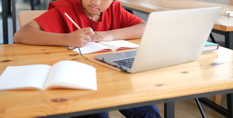 boy student studying learning lesson online. remote meeting distance education at home