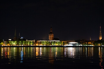 Fototapeta na wymiar Riga city panoramic view across Daugava river at night