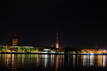 Fototapeta na wymiar Riga city panoramic view across Daugava river at night
