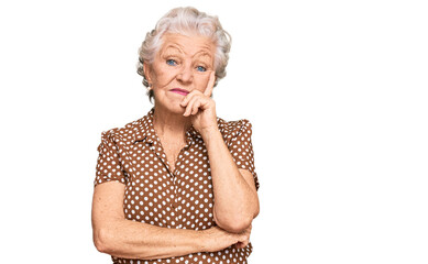 Senior grey-haired woman wearing casual clothes thinking looking tired and bored with depression...