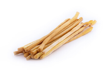 Gressini breadsticks made of wheat flour isoltaed on white background. Crispy bread from France