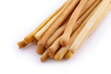 Gressini breadsticks made of wheat flour isoltaed on white background. Crispy bread from France