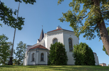 Fototapeta na wymiar Church on a hill in a Saldus.