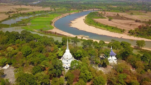 4K-Top view from flying drone over Wat Phra phut tha bat,temple and pagoda  in Mahashanachai town, Yasothon  province,Thailand,ASIA.