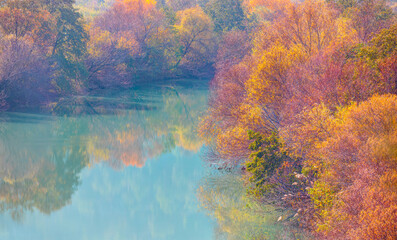 Fototapeta na wymiar Colorful majestic Goksu river in national park with autumn forest - Mersin, Turkey