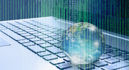 Glass globe on laptop keyboard with binary code "Elements of this image furnished by NASA "