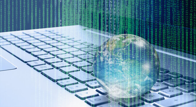 Glass globe on laptop keyboard with binary code "Elements of this image furnished by NASA "