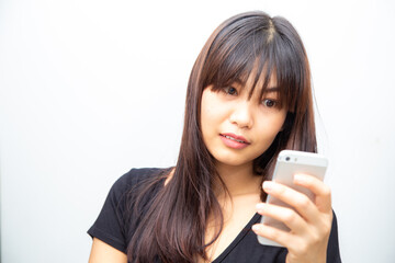 Fototapeta premium Women's hands use smartphone for online shopping and social networking hand close up