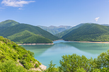 Naklejka na ściany i meble Zhinvali reservoir, lake landscape with mountains, Georgian military road. Georgia.