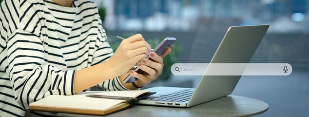 Search Engine Optimization - SEO concept. Close up of woman hands using smartphone, work with...