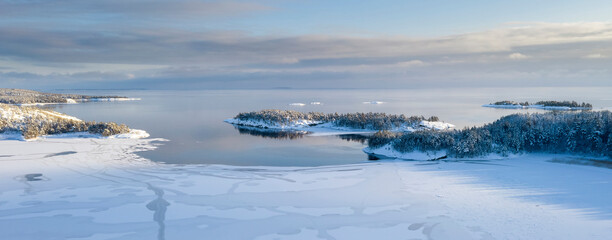 National Park Ladoga Skerries, in winter in Karelia. Small islands in the snow on Lake Ladoga
