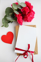 Happy Valentine's Day greeting card. bouquet of flowers and red heart on white background 