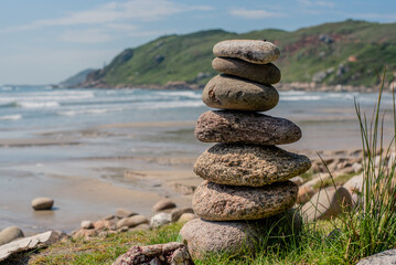 Balance stones. Pebbles on the beach by the sea. 