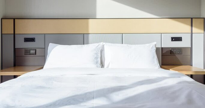 Time lapse of sunlight flowing on bed and wall.4K resolution