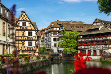 Fototapeta na wymiar Little France (La Petite France), a historic quarter of the city of Strasbourg in eastern France. Charming half-timbered houses. Famous Maison de Tanneurs house.