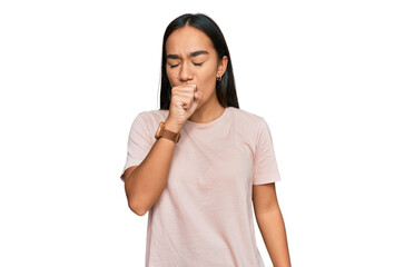 Young asian woman wearing casual clothes feeling unwell and coughing as symptom for cold or...