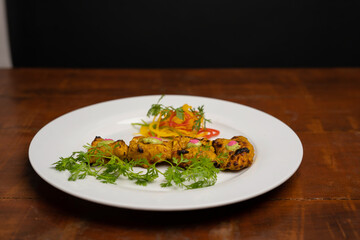 Chicken skew Kebab.Traditional Indian dish cooked on charcoal and flame.