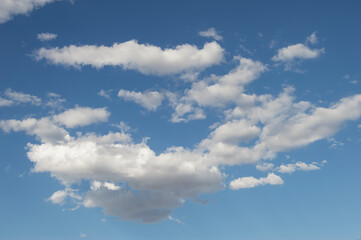 Naklejka na ściany i meble background with sky with cumulus clouds seen from Spain