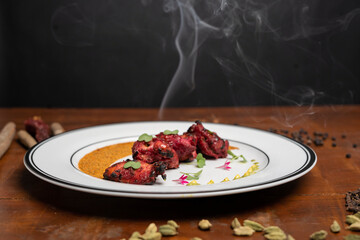 Chicken skew Kebab.Traditional Indian dish cooked on charcoal and flame.