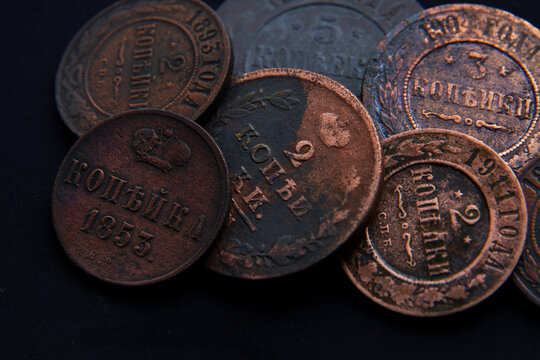 Background from old money of Imperial Russia. 19 - 20 century.Vintage multi-colored Russian coins (translation: Kopeck)